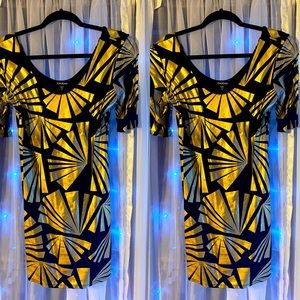 BEBE Black and Gold mini dress